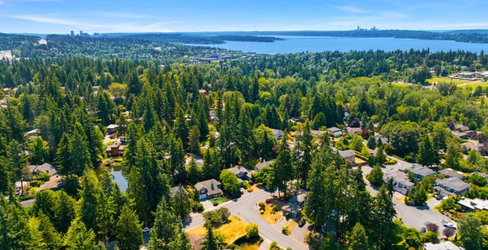 Aerial view over Kirkland Highlands neighborhood toward Lake Washington and the Seattle skyline