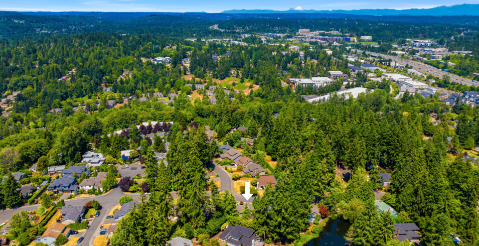 Aerial view with arrow marking Kirkland Highlands home, Totem Lake district beyond