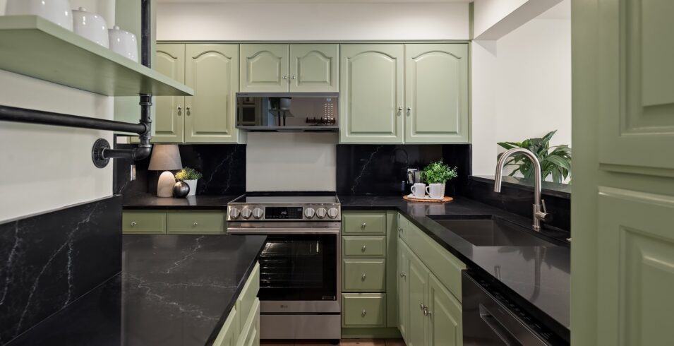 Kitchen with new stainless range and quartz counters