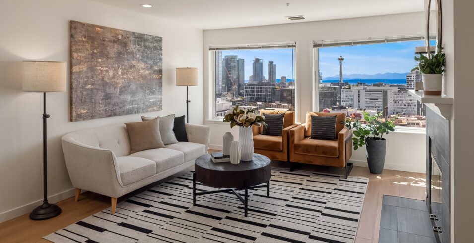 Living room with west-facing windows and city view