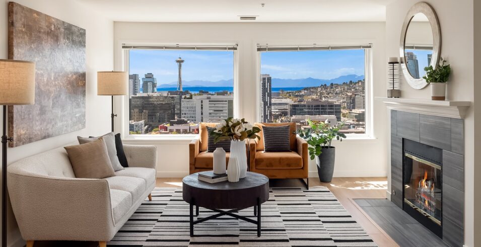 Living room with gas fireplace and Space Needle view