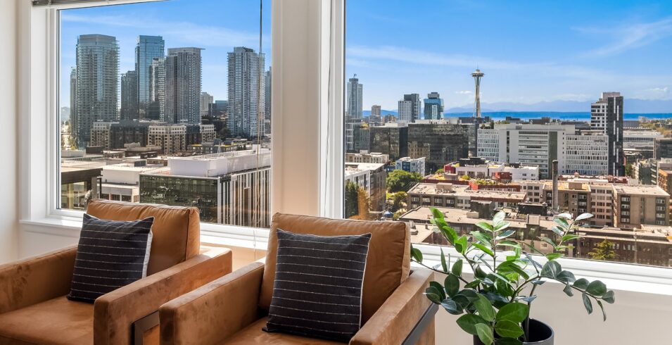 Window wall framing downtown Seattle and the Space Needle