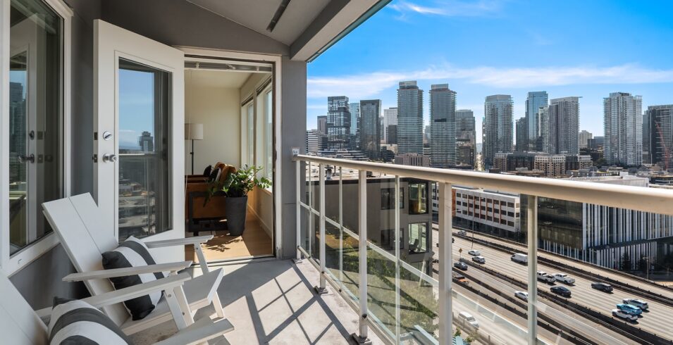 Private main-level balcony with glass railing